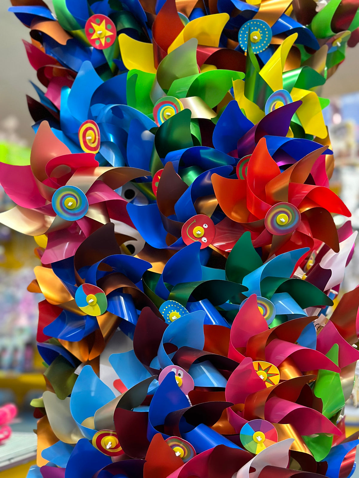 Colourful Rainbow Windmill On A Stick